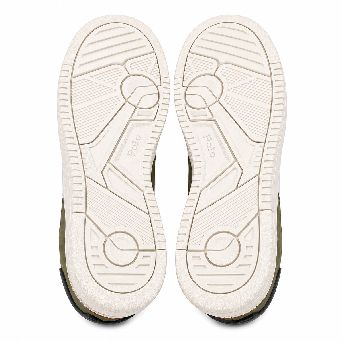 Top-down view of a pair of Polo shoes showing the cream-colored outsoles with embossed geometric tread patterns and the Polo brand name.