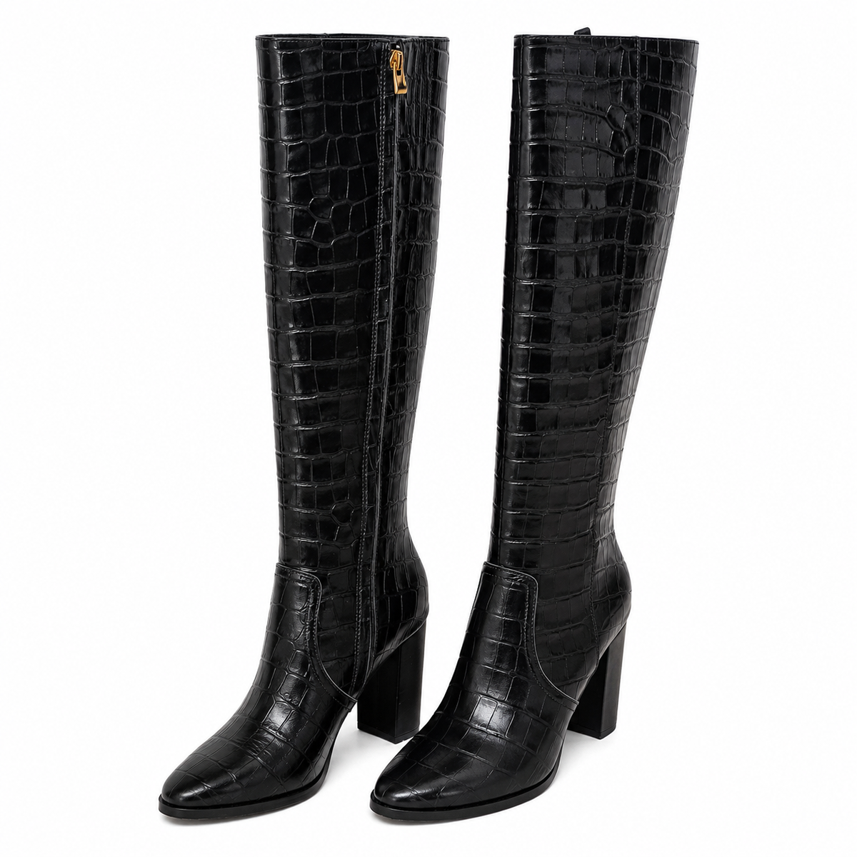 A pair of black knee-high boots with a glossy crocodile-embossed texture, featuring a block heel, pointed toe, and a gold zipper pull on a white background.