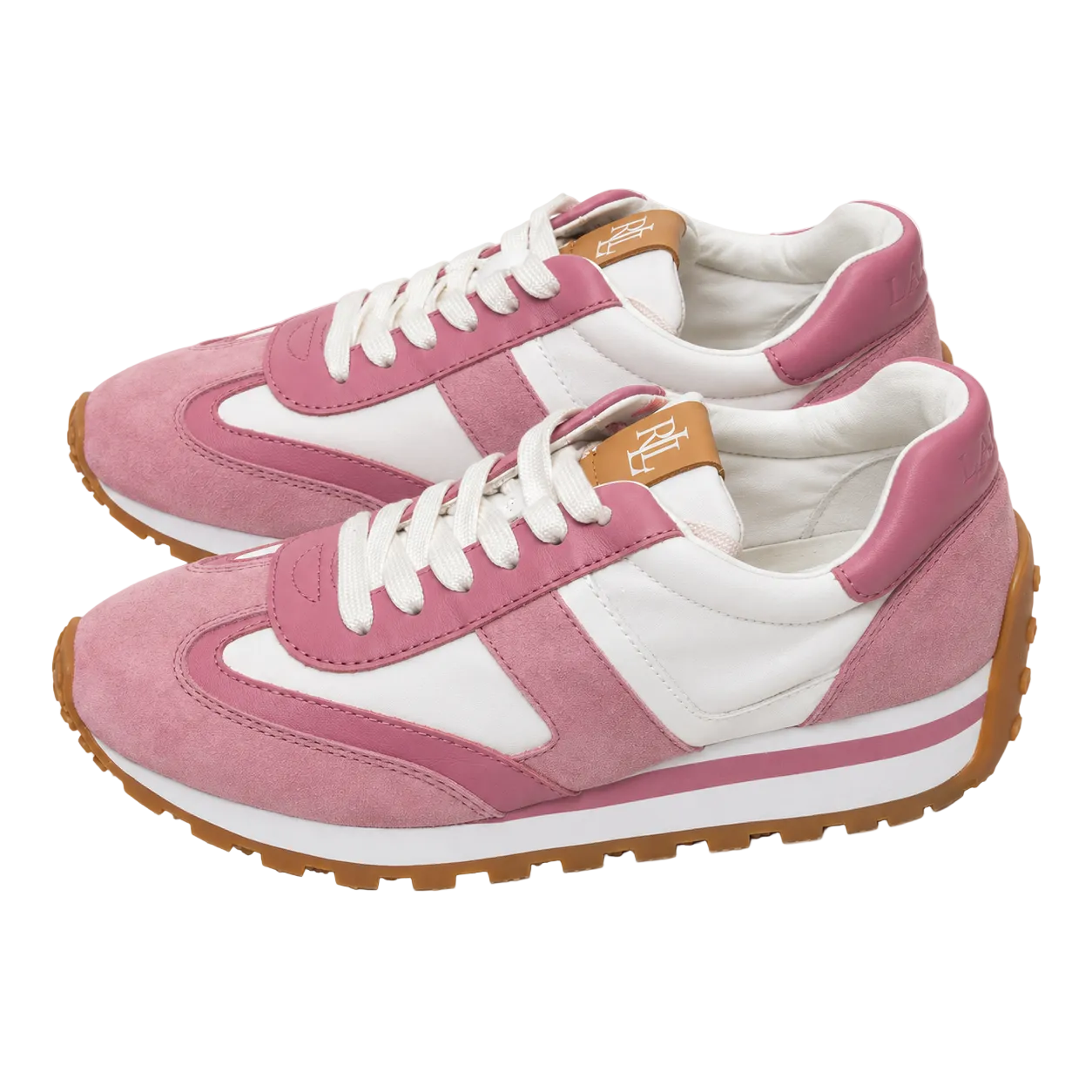 A pair of low-top sneakers in pink and white suede and leather, featuring white laces, a white midsole stripe, and a brown gum outsole, shown on a white background.