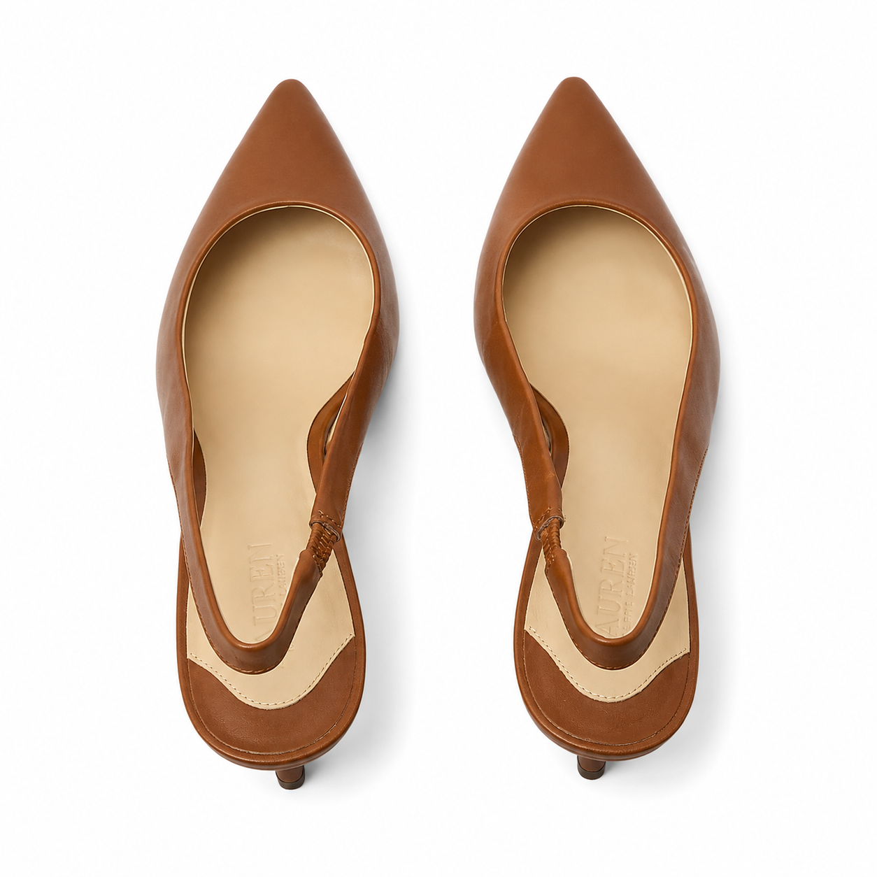 A pair of pointed-toe slingback pumps in tan leather with a light beige insole, shown from a top-down view on a white background.