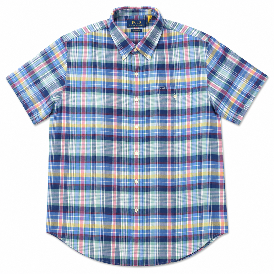 A short-sleeve button-up plaid shirt by Ralph Lauren, featuring a multicolor pattern of blue, pink, yellow, and white intersecting plaid stripes on a white background.