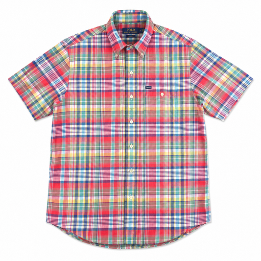 A short-sleeve button-up plaid shirt by Ralph Lauren, featuring a vibrant multicolor tartan pattern with red, blue, green, yellow, and white stripes, displayed flat against a white background.