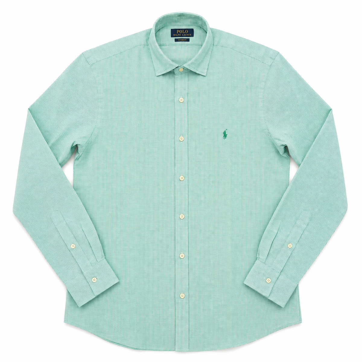 A light mint green long-sleeve button-down shirt by Polo Ralph Lauren, featuring the signature embroidered polo player logo on the left chest, laid flat on a white background.
