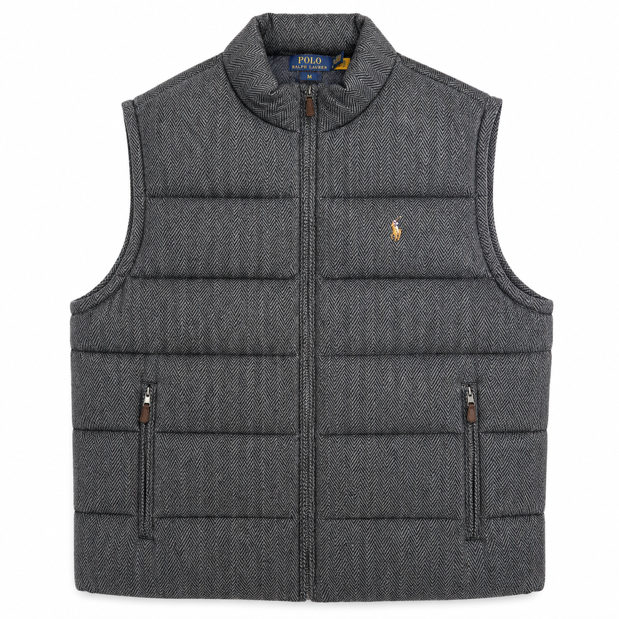 A dark gray herringbone quilted puffer vest with a full-zip front, stand-up collar, and two vertical zippered pockets. The iconic embroidered polo player logo is visible on the left chest, indicating the Polo Ralph Lauren brand.