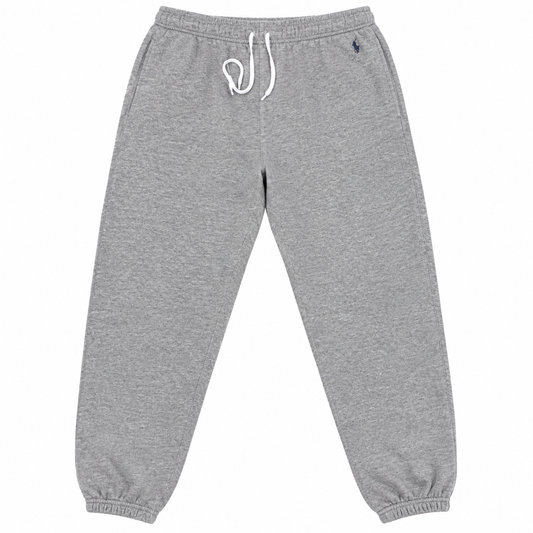 A pair of heather gray jogger pants with a white drawstring and a small navy blue embroidered polo player logo on the left hip, shown against a plain white background.
