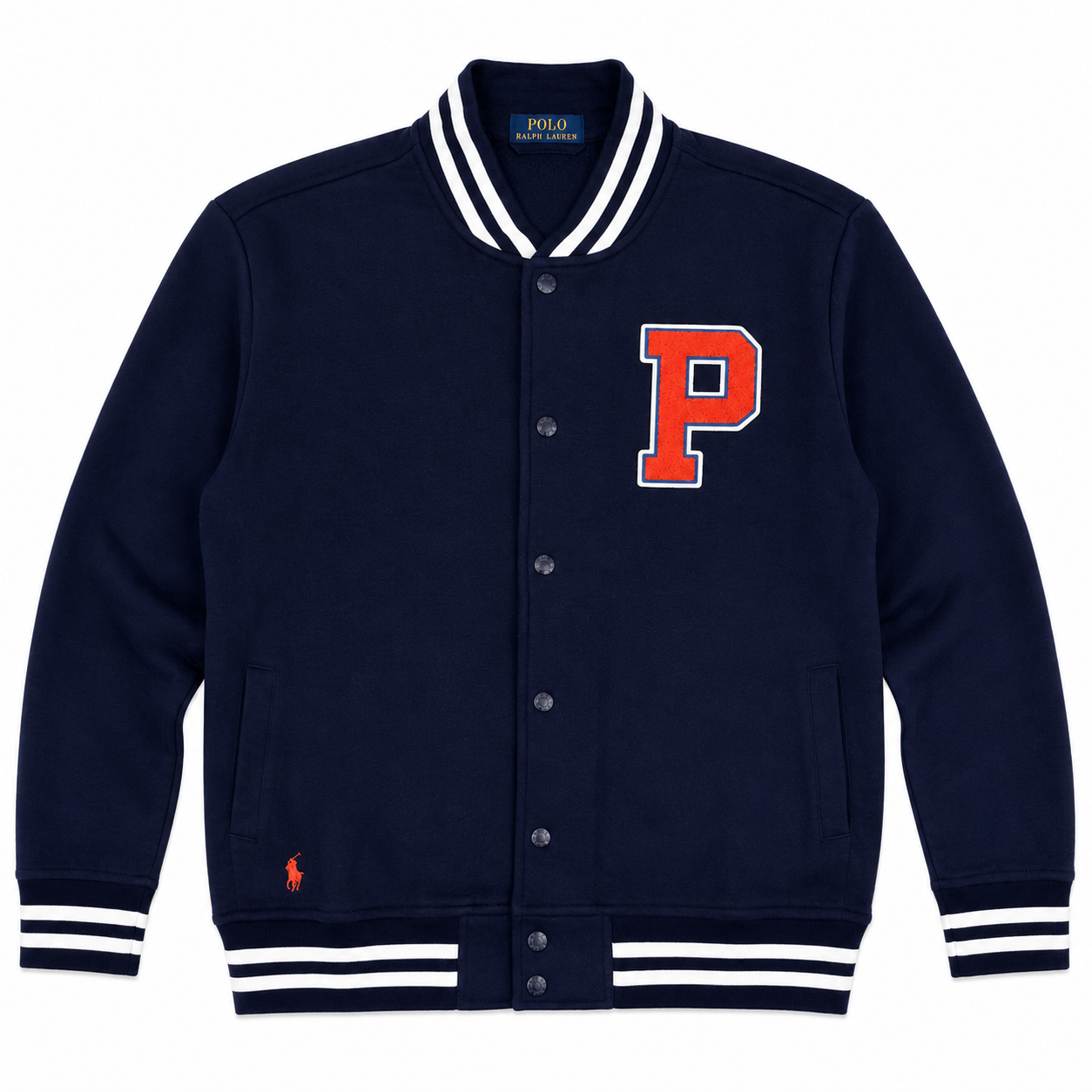 A navy blue Polo Ralph Lauren varsity jacket with white and navy striped ribbed collar, cuffs, and hem, featuring a red and white embroidered letter 'P' on the chest and a small red polo player on the lower left front.