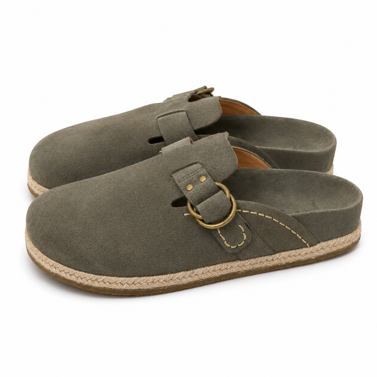 A pair of women's slip-on clogs in dark olive green suede, featuring a decorative brass-tone buckle strap, contrast stitching, and a braided jute-wrapped midsole on a white background.