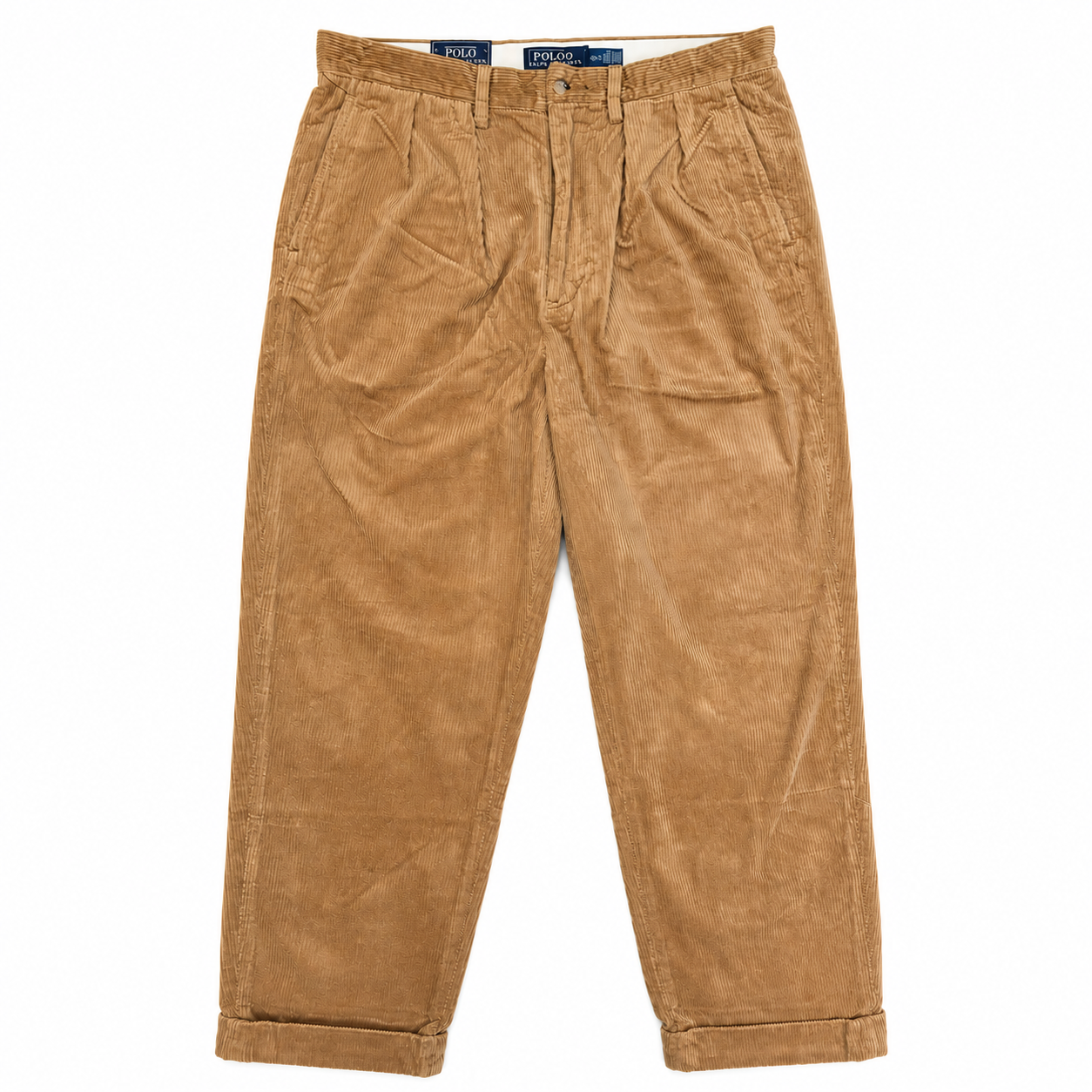 A pair of tan corduroy trousers with a relaxed straight-leg fit, laid flat against a white background. The brand name 'JIL SANDER' is visible on the inner waistband labels.